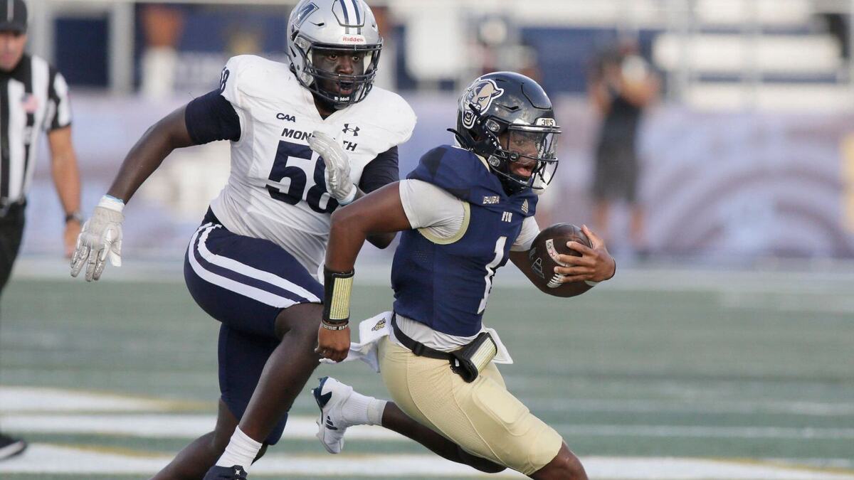 FIU Panthers quarterback Keyone Jenkins gains yardage against Monmouth Hawks during football game on Saturday, September 21, 2024 at Pitbull Stadium in Miami. Andrew Uloza / for Miami Herald