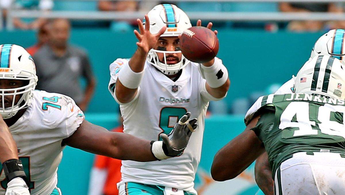 Miami Dolphins quarterback Matt Moore (8) in the third quarter as they play the New York Jets at Hard Rock Stadium in Miami Gardens, Florida, October 22, 2017.