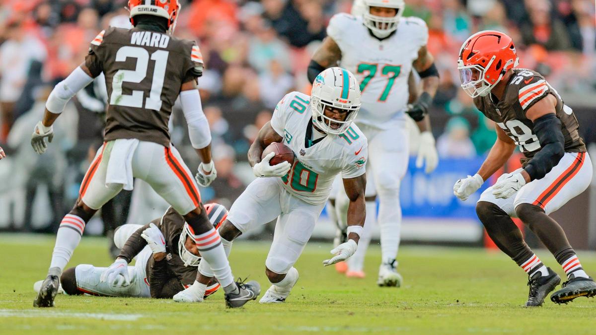 Miami Dolphins wide receiver Tyreek Hill (10) on a pass reception against the Cleveland Browns during the first half of an NFL Football game at Huntington Bank Field in Cleveland, Ohio on Sunday, December 29, 2024.