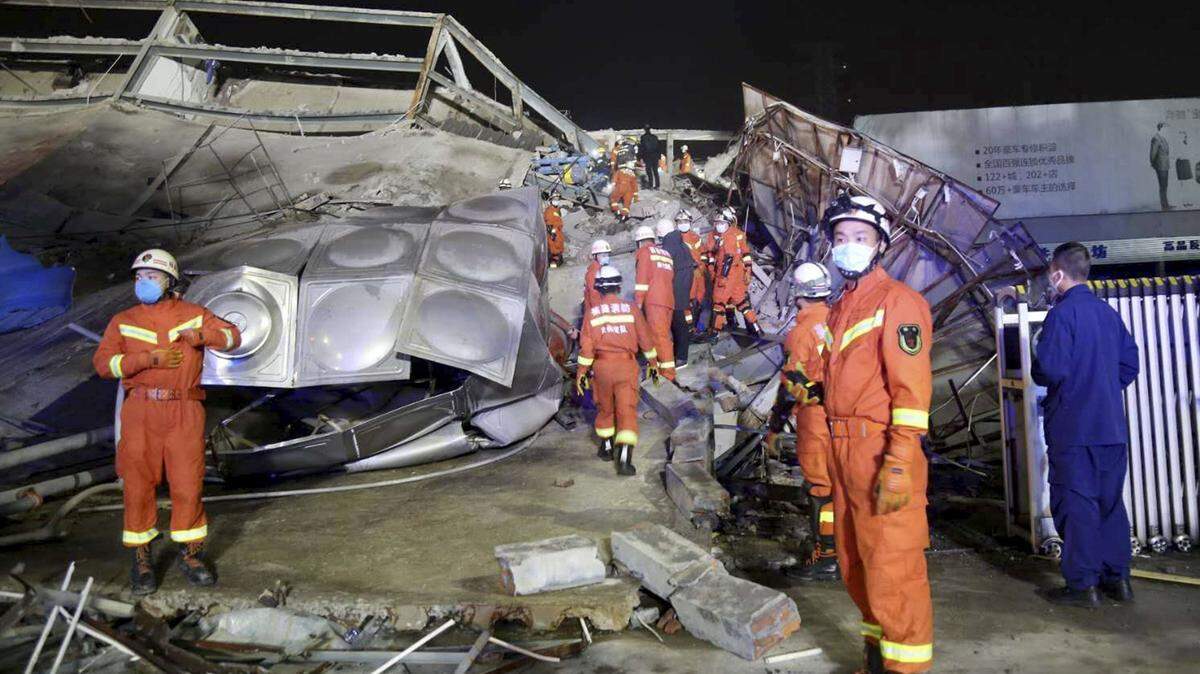 Rescuers work at the site of a collapsed five-story hotel building in Quanzhou city in southeast China’s Fujian province Saturday, March 7, 2020. The hotel, which was used for medical observation of people who had contact with coronavirus patients, collapsed in southeastern China on Saturday, trapping dozens, state media reported.