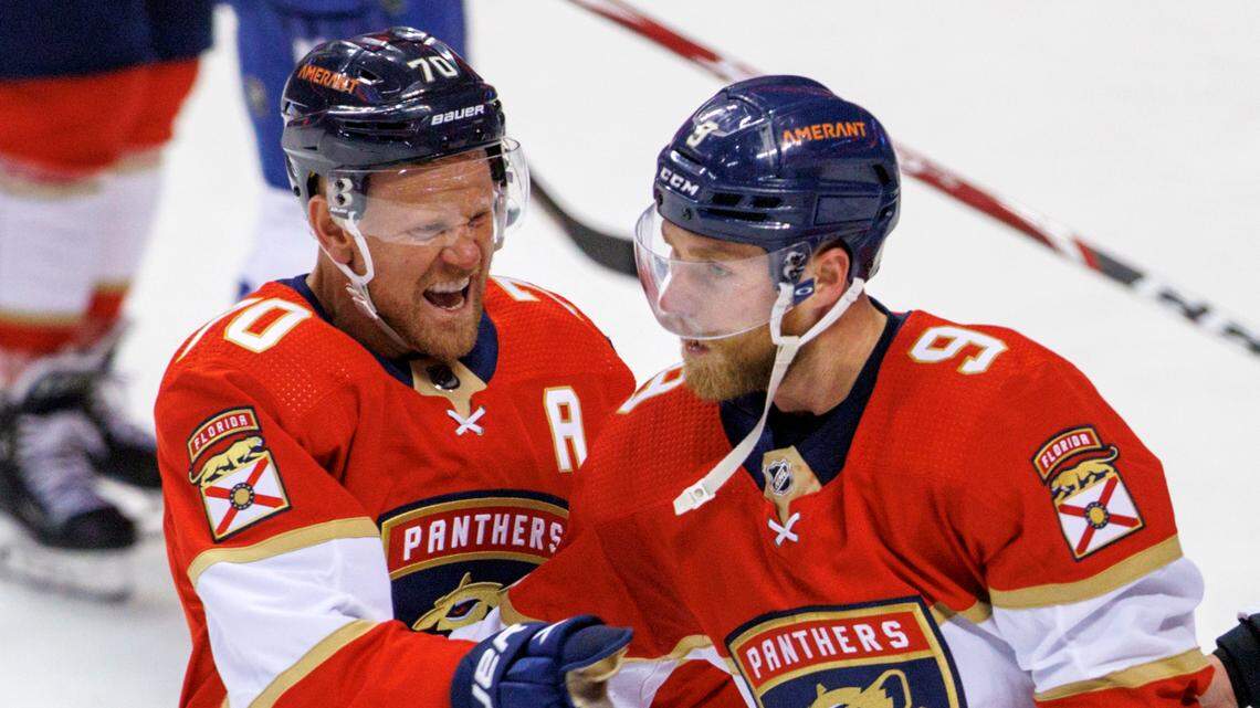Florida Panthers center Sam Bennett (9) skates to the penalty box as right wing Patric Hornqvist (70) shows his support after fighting with Tampa Bay Lightning defenseman Mikhail Sergachev (98) during the second period of an NHL game at the FLA Live Arena on Sunday, April 24, 2022 in Sunrise, Fl.