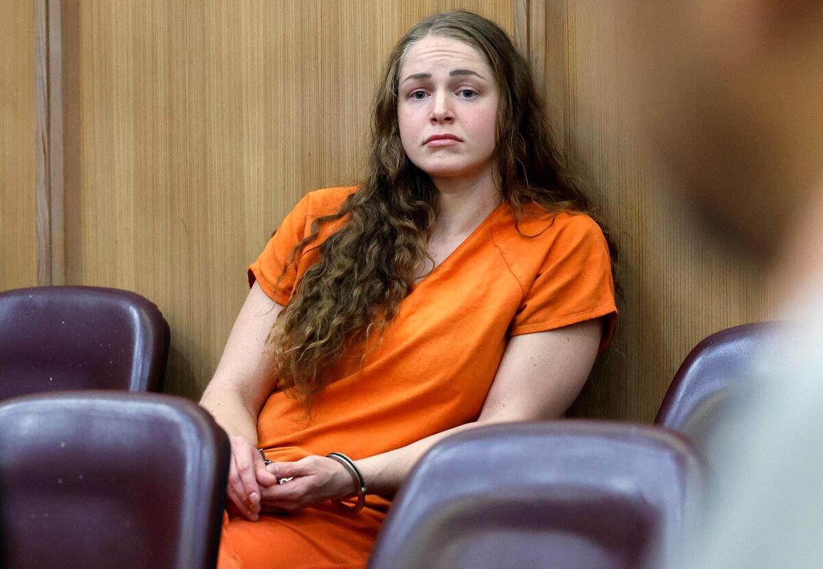 Defendant Courtney Clenney, Miami OnlyFans model accused of murdering boyfriend, sits at Miami-Dade Circuit Court Judge Laura Sheron Cruz, courtroom at the Miami-Dade County Courthouse in Miami, Florida, on Thursday, December 19, 2024. Attorneys Sabrina Vora-Puglisi Frank Prieto