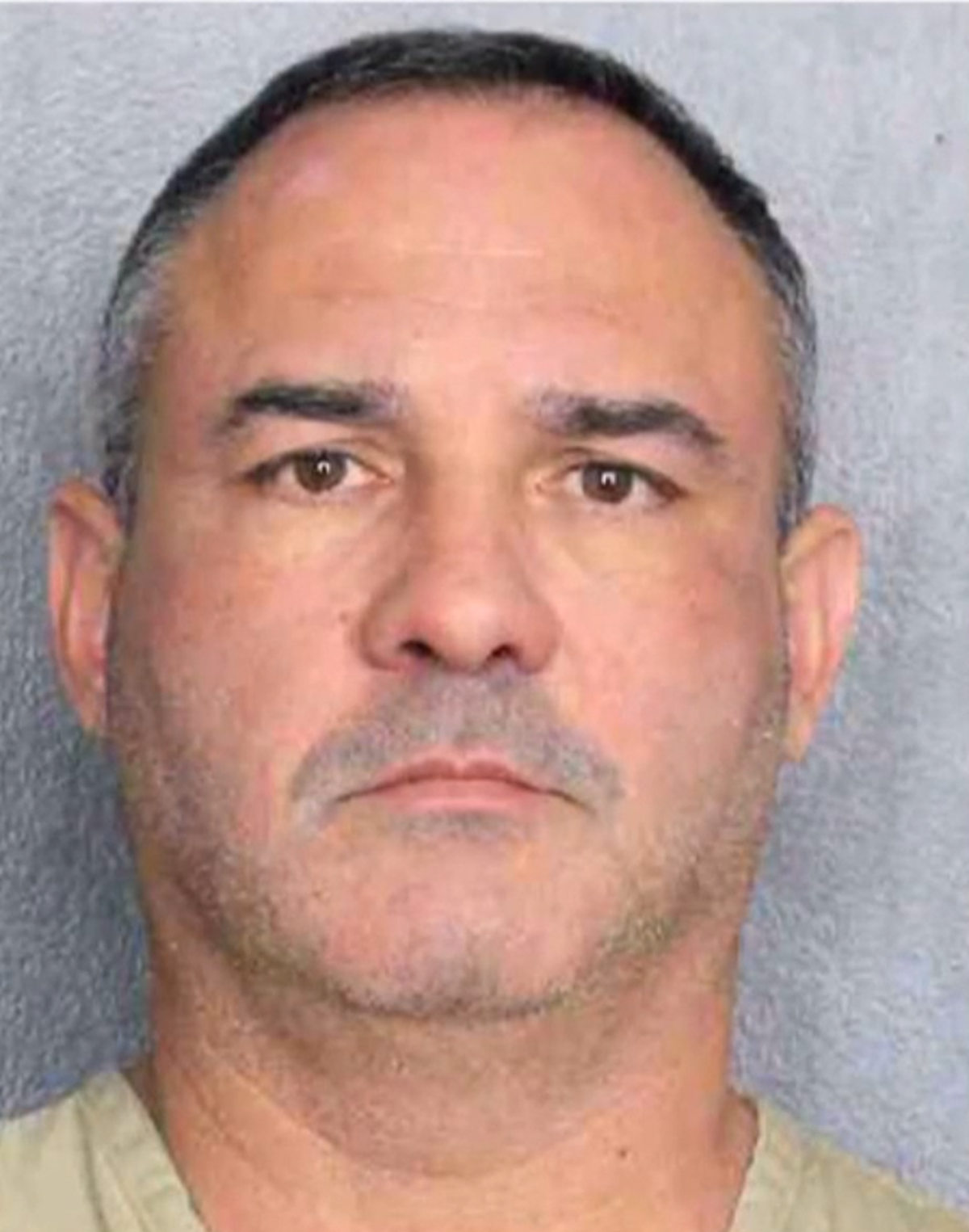 Hollywood Police Lt. Osvaldo Perez is facing charges of aggravated battery on a person 65 years of age or older and battery on a person 65 years of age or older.