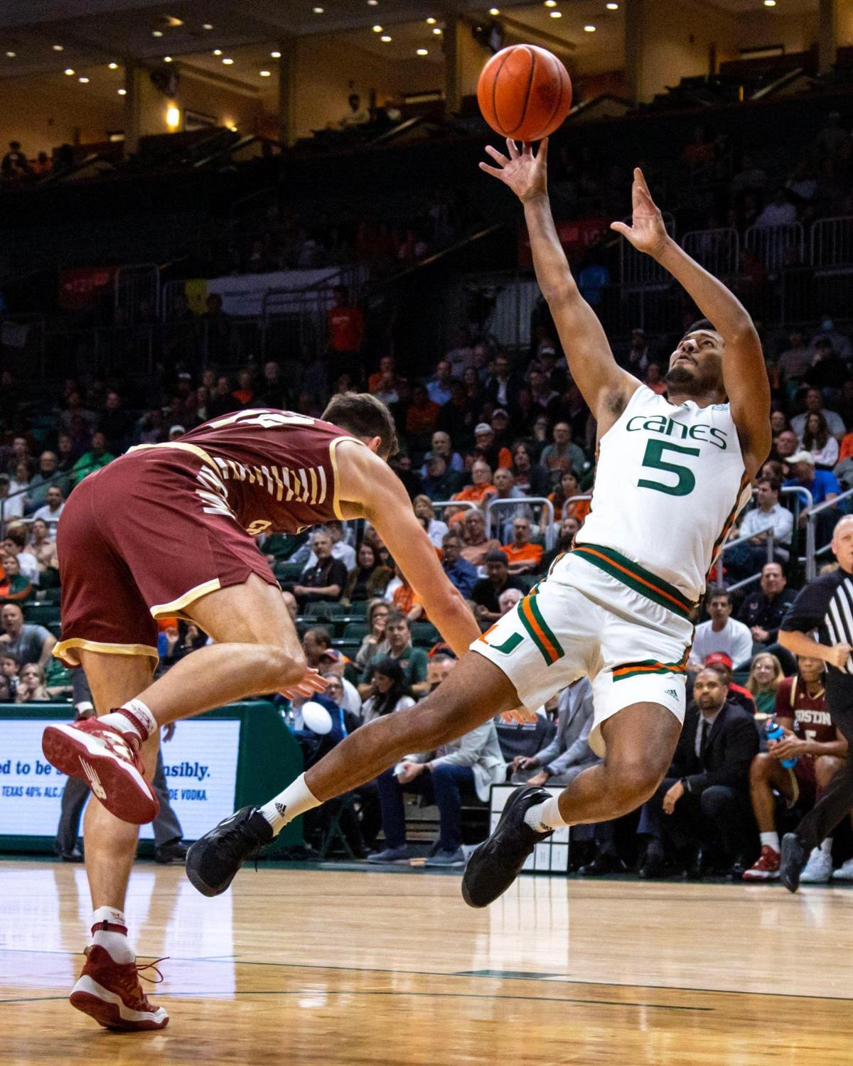 Hurricanes guard Harlond Beverly shoots the ball after being fouled by Boston College’s Quinten Post. Beverly scored 15 points off the bench, hitting six of his seven shots.
