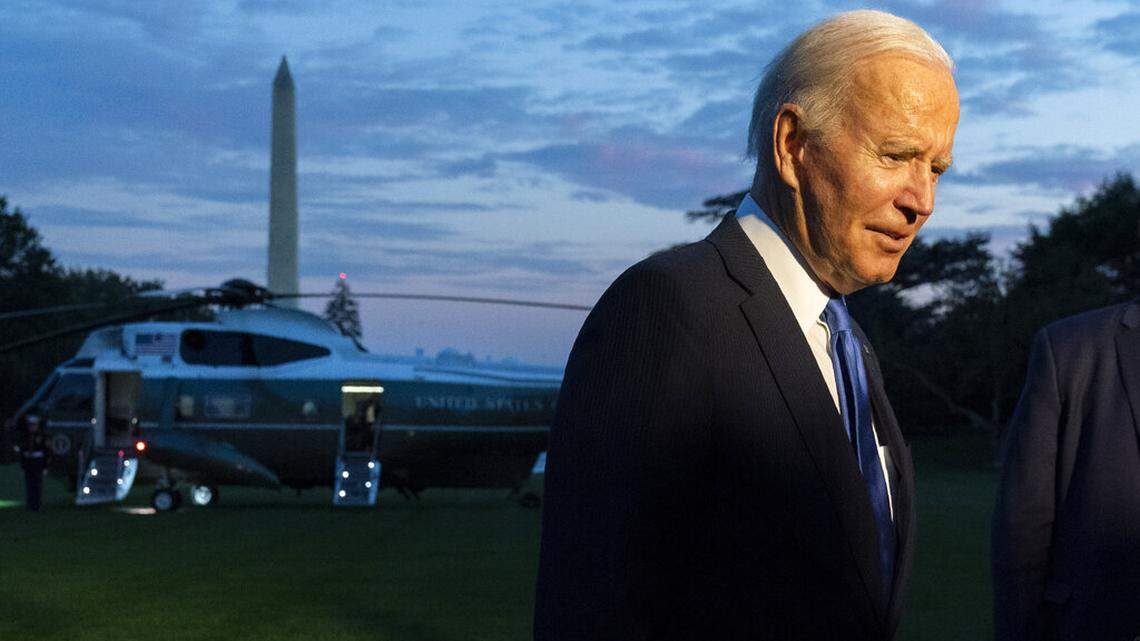 President Joe Biden speaks to reporters on the South Lawn upon arrival at the White House in Washington on Friday, Oct. 15, 2021.
