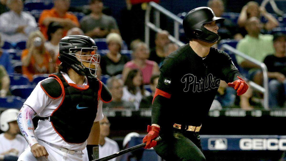 Marlins catcher Jorge Alfaro looks on as Phillips’ left fielder Corey Dickerson hits a three runs RBI double in the seventh inning of the Miami Marlins vs Philadelphia Philips, game at the Marlins Park in Little Havana in Miami on Saturday August 24, 2019.
