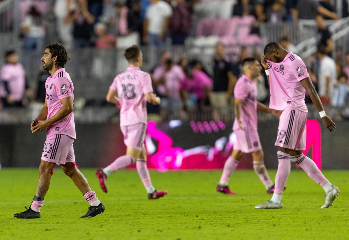 Inter Miami CF players walk off the pitch after losing 1-0 to FC Dallas during an MLS soccer game at DRV PNK Stadium in Fort Lauderdale, Florida, on Saturday, April 8, 2023.