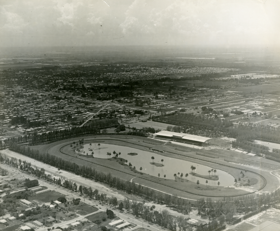 Aerial view of the Hialeah Park Racetrack on August 31, 1955. The racetrack club was in the process of remodeling and building a new building next to the old building. In its surroundings you can see the houses and parks