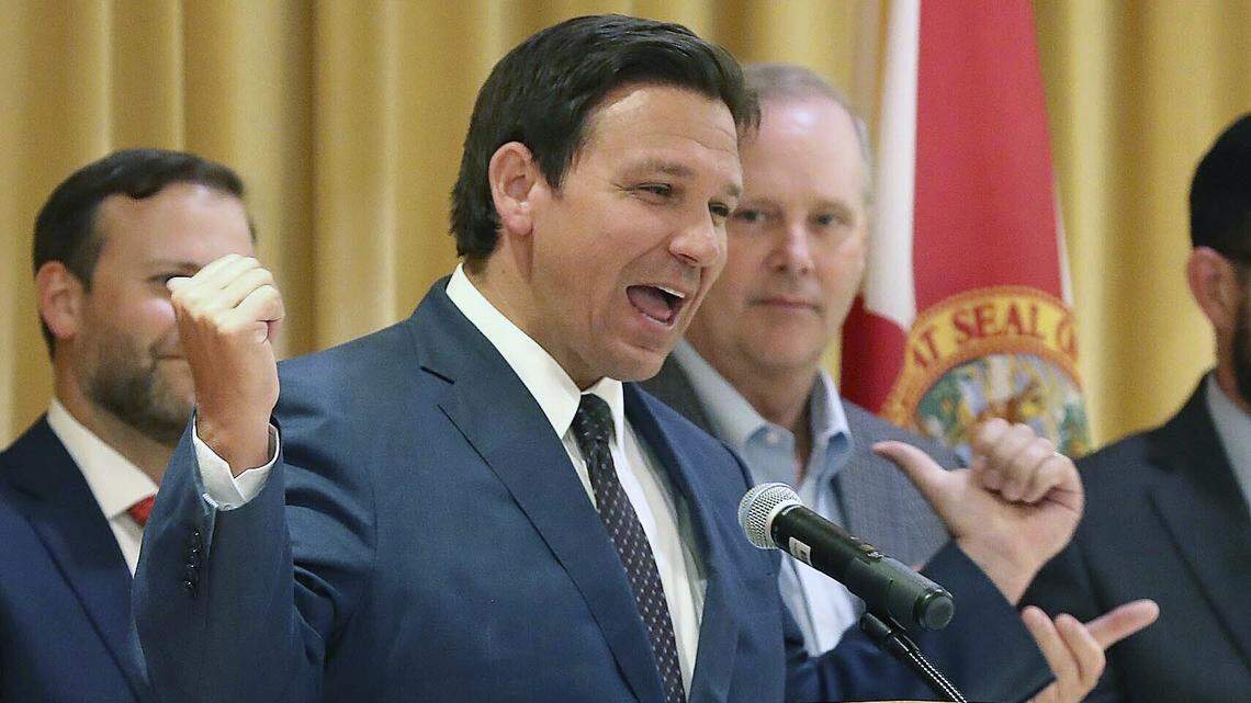 Florida Gov. Ron DeSantis speaks before he signs a record $109.9 billion state budget Thursday, June, 2, 2022 at The Villages, Fla. DeSantis told the cheering crowd of senior citizens that the vetoes were ‘making sure that we’re protecting your money.’ ‘They may not be clapping about that,’ DeSantis then joked, gesturing to the lawmakers behind him, ‘but that’s just the way it goes.’