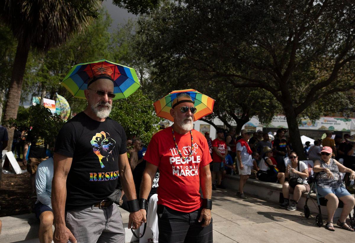 Constantine Patsimas, left, and Paul Michael attend an Anti-Hate March led by We the People on Sunday, July 2, 2023, in downtown Fort Lauderdale.