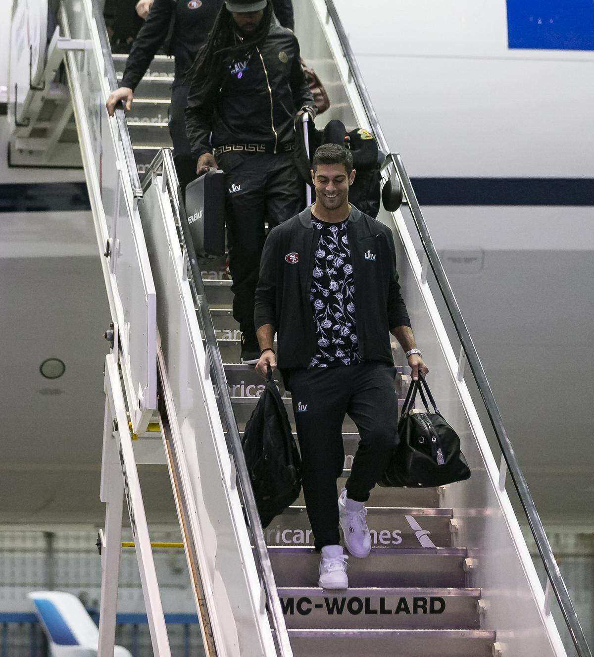 San Francisco 49ers quarterback Jimmy Garoppolo arrives at Miami International Airport for Super Bowl LIV, which has lent its Roman numeral grandiosity to everything surrounding Sunday’s big game at Hard Rock Stadium.