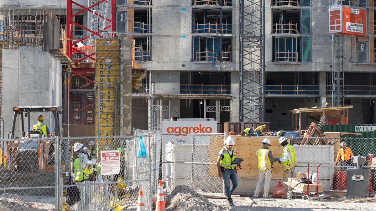 Most webinars this week focus on the construction industry. Above: Workers at the Miami Worldcenter site on NE Second Avenue and NE Eighth Street in downtown Miami in April 2020.
