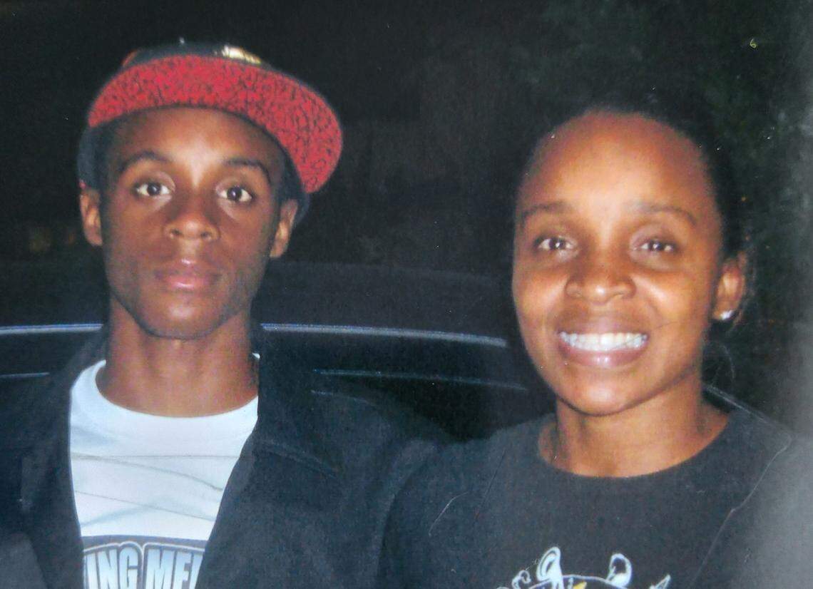 Derrick Gloster and his his mother, Tangela Johnson. Gloster was 18 when he was shot and killed in what was known as the Liberty City Massacre on Jan. 23, 2009.