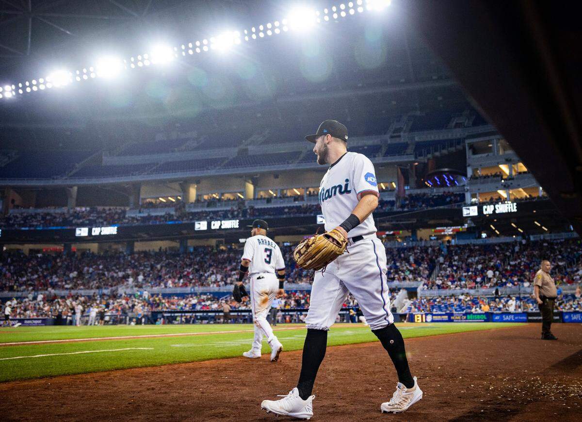 Miami Marlins left fielder Garrett Hampson (1) walks onto the field during a baseball game on Sunday, Sept. 17, 2023, at loanDepot Park in Miami, Fla.