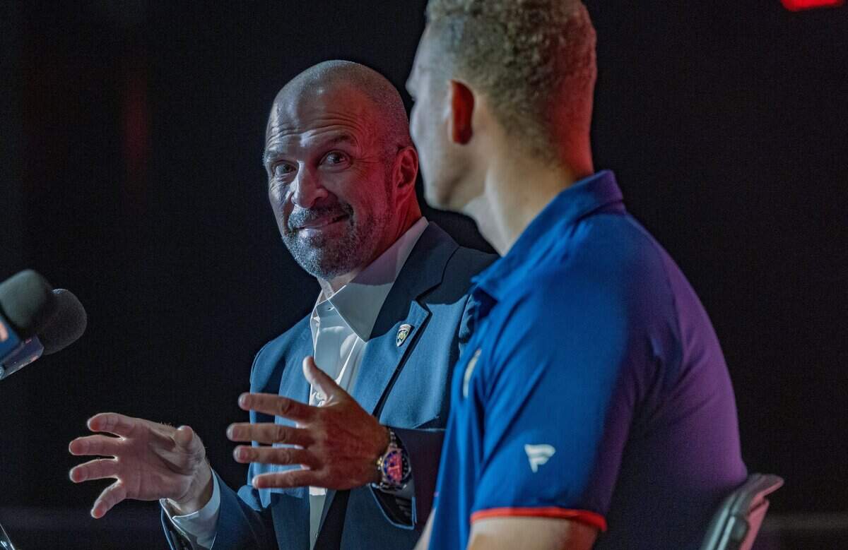 Bill Zito (left), President of Hockey Operations & General Manager, speaks as he introduces the newly-acquired Florida Panthers' forward Brady Tkachuk, during a press conference at the War Memorial Auditorium in Fort Lauderdale, on Tuesday June 23, 2026.
