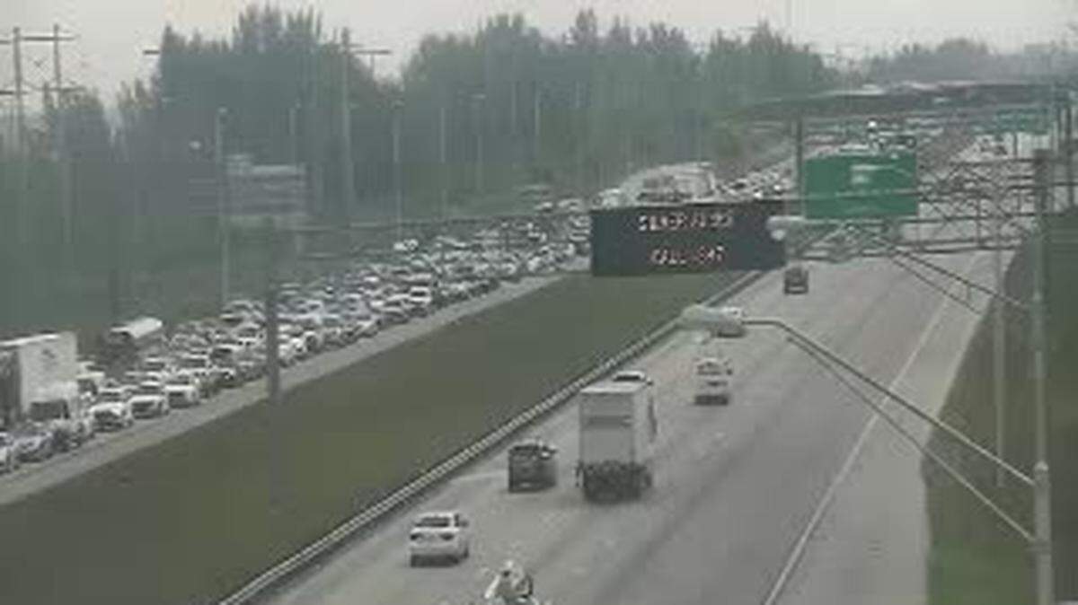 Sawgrass Expressway southbound traffic stalled after a Monday morning crash and fire of a semi-truck.