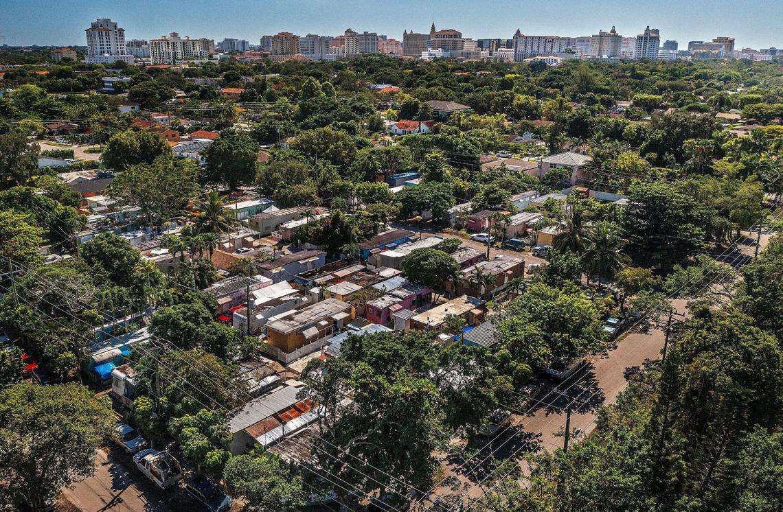 View of the Coral Gables skyline in the distance and trailer homes at the Gables Trailer Park, which has approximately 90 trailers and is located across from Graceland Memorial Park North on SW 44th Avenue. Residents are worried about being displaced as the city of Coral Gables is moving forward with the annexation process, on Wednesday, October 18, 2023.