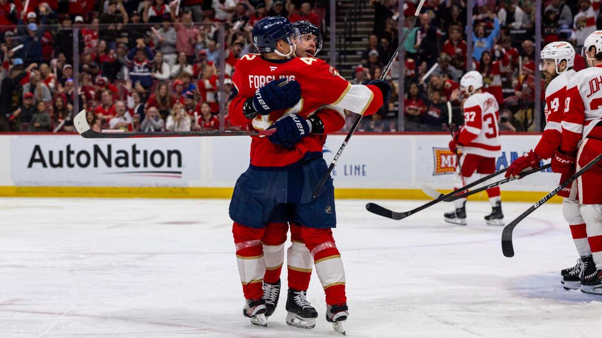Florida Panthers center Evan Rodrigues (17) reacts with defenseman Gustav Forsling (42) after scoring on Detroit Red Wings goaltender Cam Talbot (39) during the second period of an NHL game at Amerant Bank Arena on Thursday, April 10, 2025, in Sunrise, Fla.