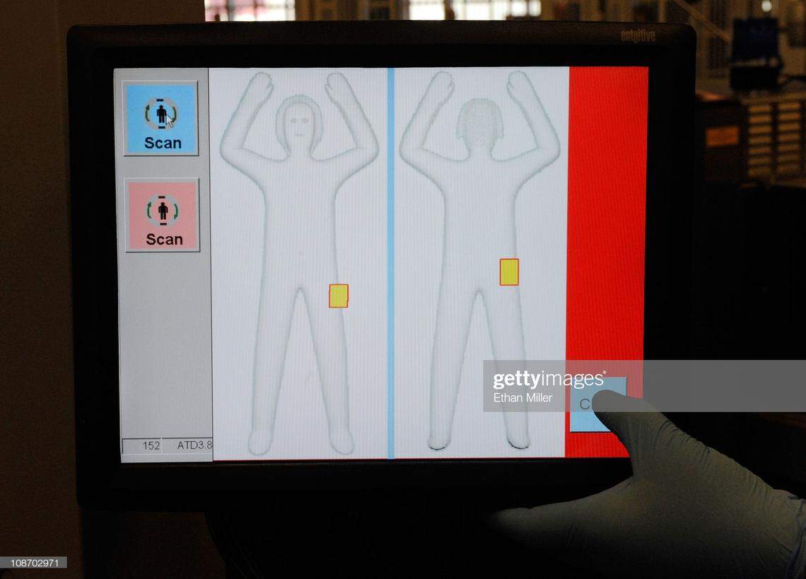 A monitor shows a generic body image from an advanced image technology (AIT) millimeter wave scanner using new Automated Target Recognition software being tested by the U.S. Transportation Security Administration at McCarran International Airport February 1, 2011 in Las Vegas, Nevada.