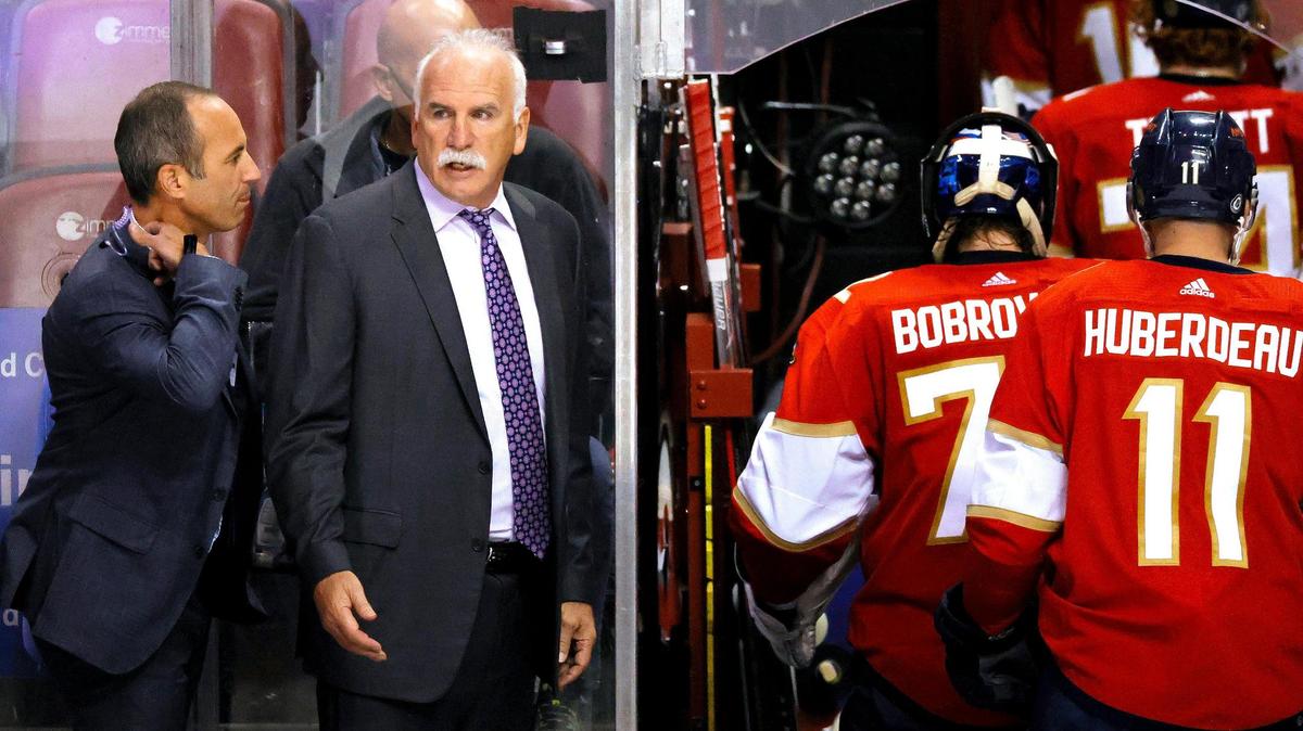 Florida Panthers head coach Joel Quenneville talks with assistant coach Derek MacKenzie as the players go to the locker room after finishing the first period of an NHL game against the Boston Bruins at the FLA Live Arena on Wednesday, October 27, 2021 in Sunrise, Fl.