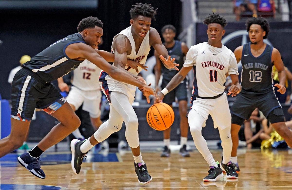 Columbus High School’s Malik Abdullahi (24) steals the ball in the game’s final seconds against Winter Haven in the FHSAA boys basketball Class 7A State Championship at the RP Funding Center in Lakeland, Florida on Saturday, March 4, 2023.