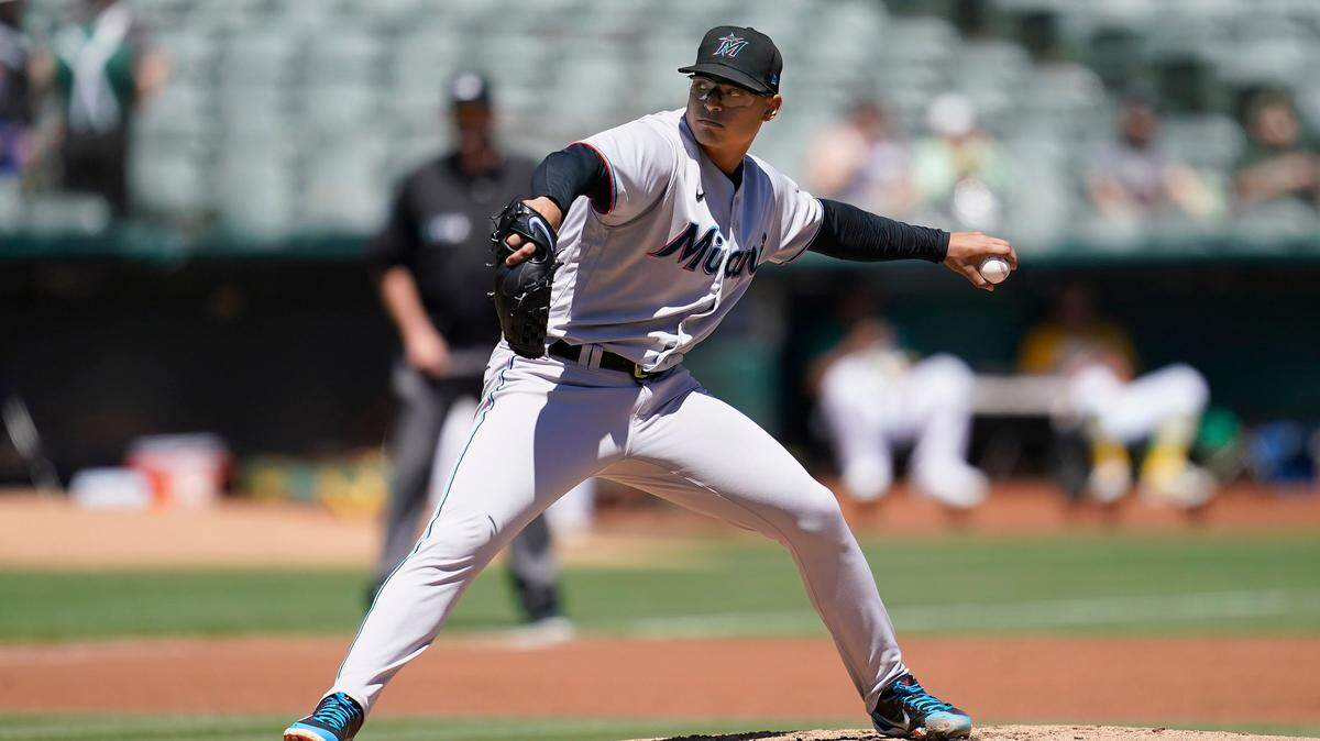Miami Marlins’ Jesus Luzardo pitches against the Oakland Athletics during the first inning of a baseball game in Oakland, Calif., Wednesday, Aug. 24, 2022.