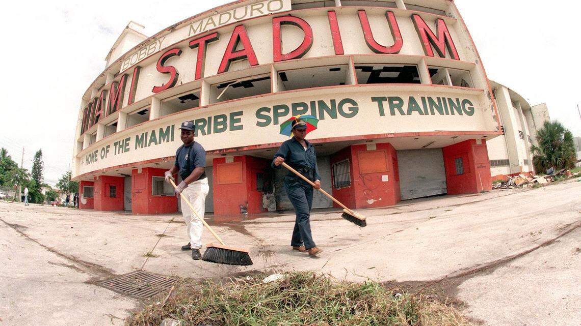 Warren Jones and Brenda Lipford clean up the front of the Miami Baseball Stadium aka Bobby Maduro Stadium which is in a state of decay. The stadium was home to the Baltimore Orioles for many years. 