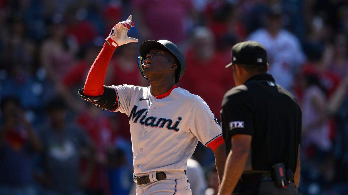 Miami Marlins’ Jesus Sanchez, left, celebrate his two-run home run during the ninth inning of a baseball game against the Washington Nationals, Sunday, July 3, 2022, in Washington. (AP Photo/Nick Wass)