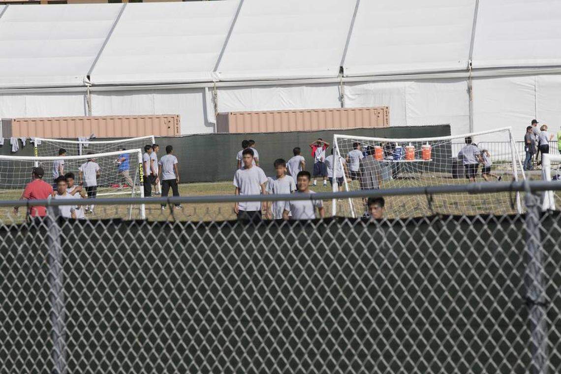 Unaccompanied undocumented children at the Homestead Temporary Shelter for Unaccompanied Children play soccer on Monday, June 18, 2018.