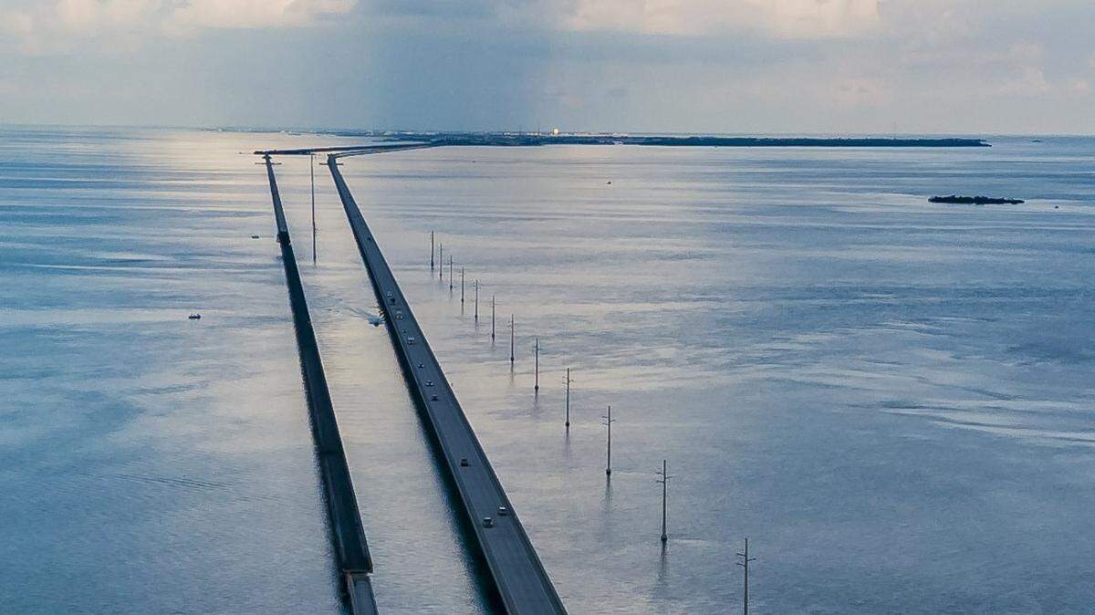Cars make their way down the Overseas Highways Seven Mile Bridge near Little Duck Key and Bahia Honda State Park on Monday, October 11, 2021.