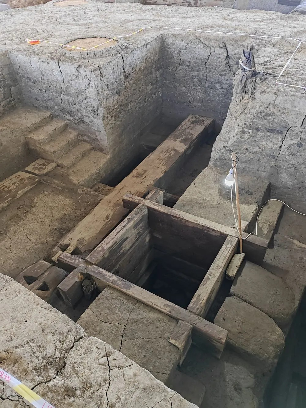 Layers of dirt and wood created box structures under the foundation of the tower.