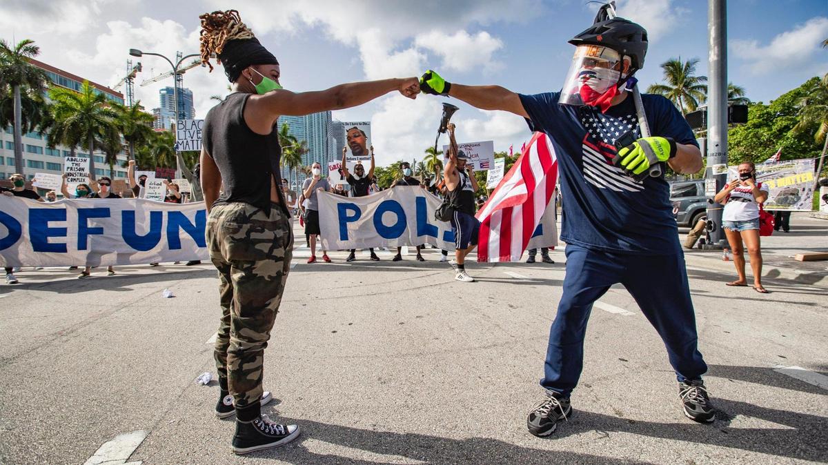 Protesters calling for the defunding of police in the wake of George Floyd’s death block Biscayne Boulevard in downtown Miami. Miami-Dade commissioners approved a new police oversight panel in a July 8 vote, but it was later vetoed by Mayor Carlos Gimenez.