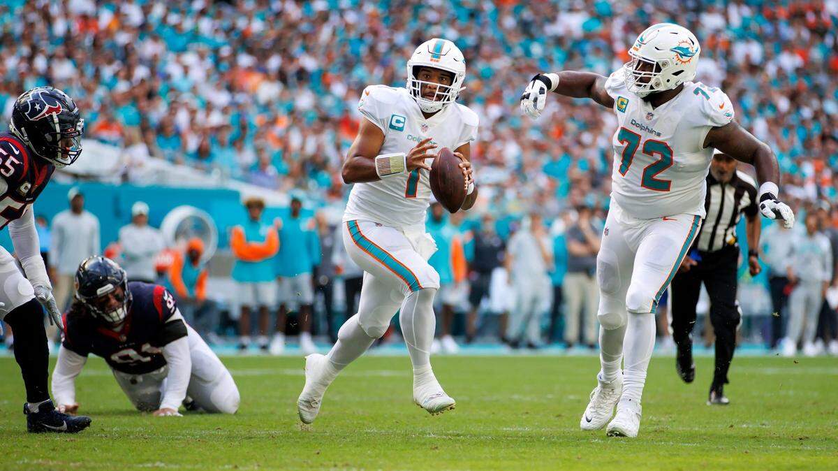 Miami Dolphins offensive tackle Terron Armstead (72) protects Dolphins quarterback Tua Tagovailoa (1) as he sets up to pass during first quarter of an NFL football game against the Houston Texans at Hard Rock Stadium on Sunday, November 27, 2022 in Miami Gardens, Florida.