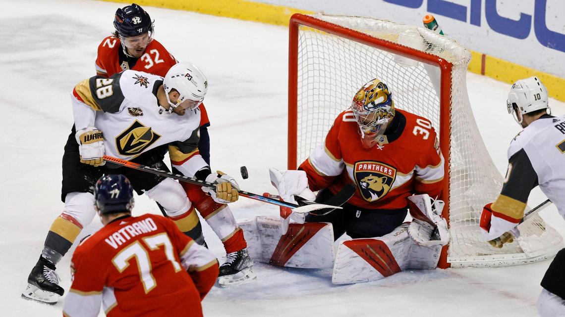 Florida Panthers goaltender Spencer Knight (30) Panthers defenseman Lucas Carlsson (32) and Panthers center Frank Vatrano (77) defends the goal from Vegas Golden Knights left wing William Carrier (28) during the third period of an NHL game at the FLA Live Arena on Thursday, January 27, 2022 in Sunrise, Fl.