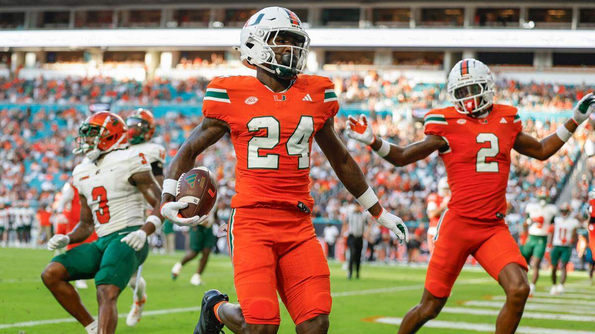 Miami Hurricanes running back Chris Johnson Jr. (24) scores in the in the first half against the Florida A&M Rattlers at Hard Rock Stadium in Miami Gardens, Florida, on Saturday, September 7, 2024.
