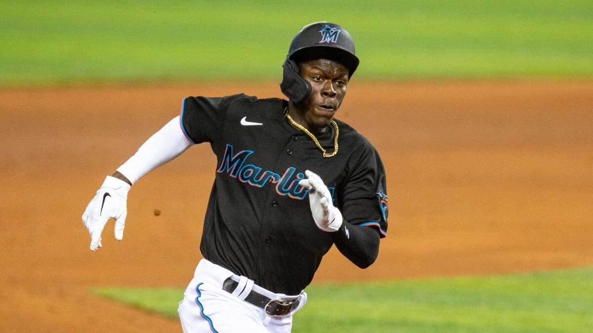 Miami Marlins Jazz Chisholm Jr. (2) triples during the seventh inning of an MLB game against the Tampa Bay Rays at loanDepot park in the Little Havana neighborhood of Miami, Florida, on Friday, April 2, 2021. 