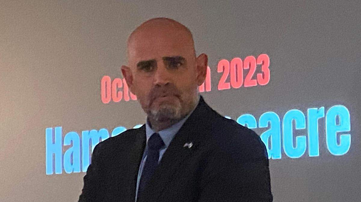 Maor Elbaz-Starinksy, consulate general of Israel in Miami, stands in front of a movie screen after raw footage of Hamas’ Oct. 7 attack on Israel was shown to community members, journalists and dignitaries Tuesday, Dec. 5, 2023.