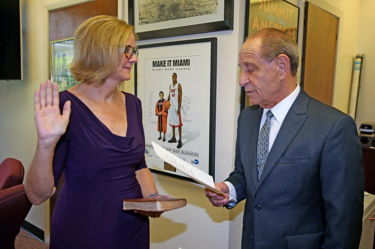 Eileen Higgins is sworn in by Miami-Dade County Clerk Harvey Ruvin  at the county's new District5 commissioner at a ceremony at the Miami-Dade Courthouse, on June 22, 2018.