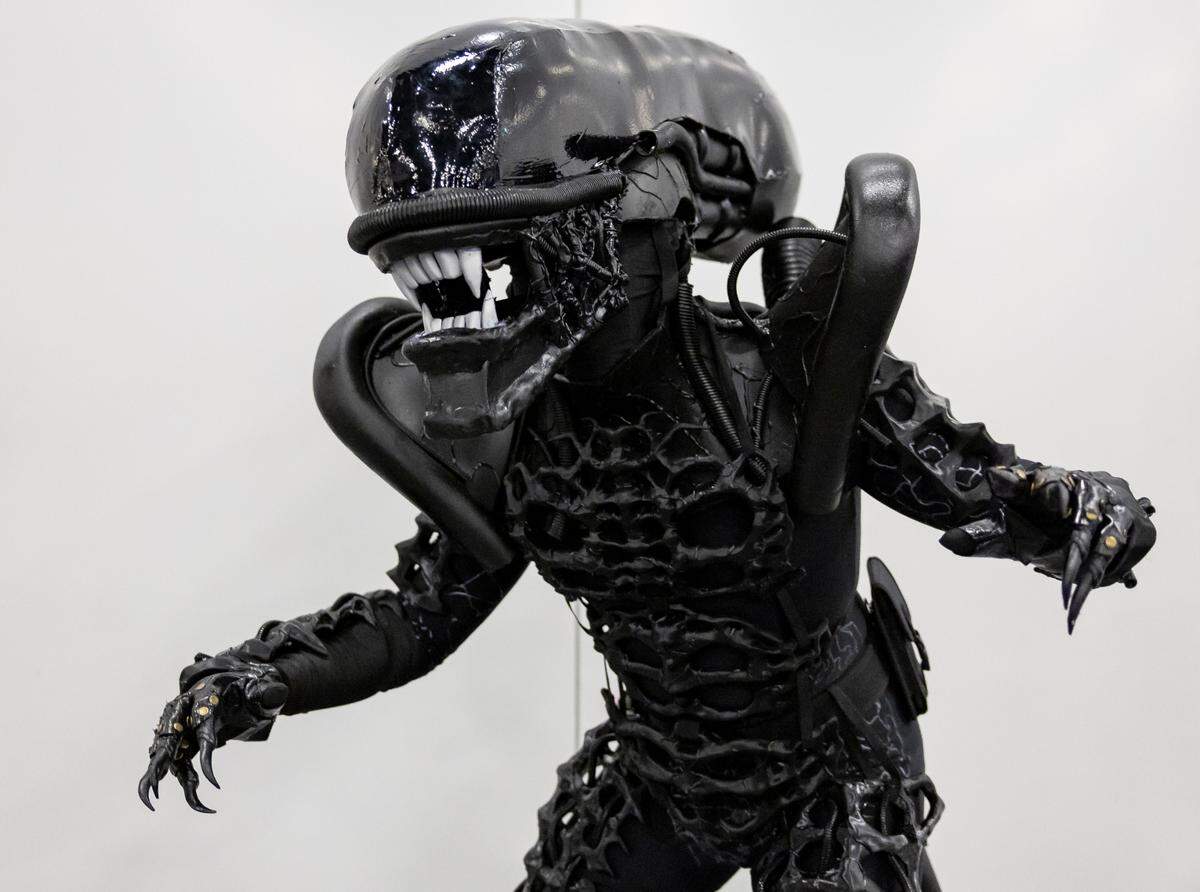 Adrian Delvalle, 24, cosplays as Alien from the Aliens franchise during Florida Supercon 2024 at the Miami Beach Convention Center on Saturday, July 13, 2024, in Miami Beach, Fla.