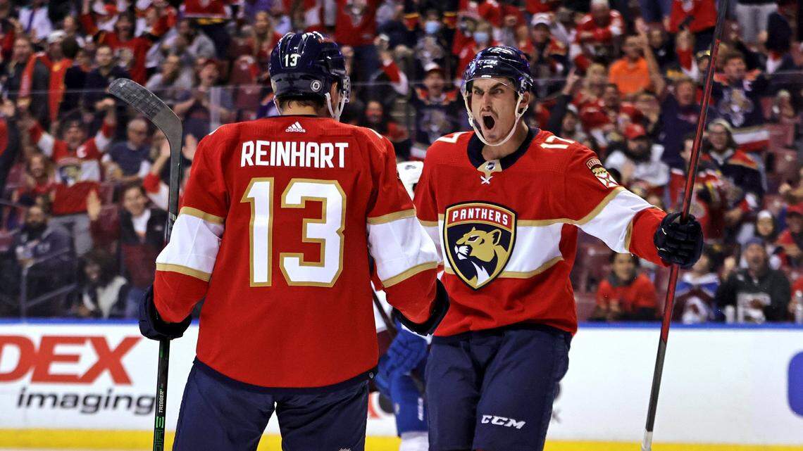 Florida Panthers left wing Mason Marchment (17) reacts after Panthers center Sam Reinhart (13) scores his first goal of the season during the first period of a NHL game against the Colorado Avalanche at the FLA Live Arena on Thursday, October 21, 2021 in Sunrise, Fl.