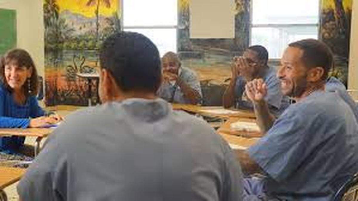Miami inmates take part in an academic discussion in class sponsored by Exchange for Change.