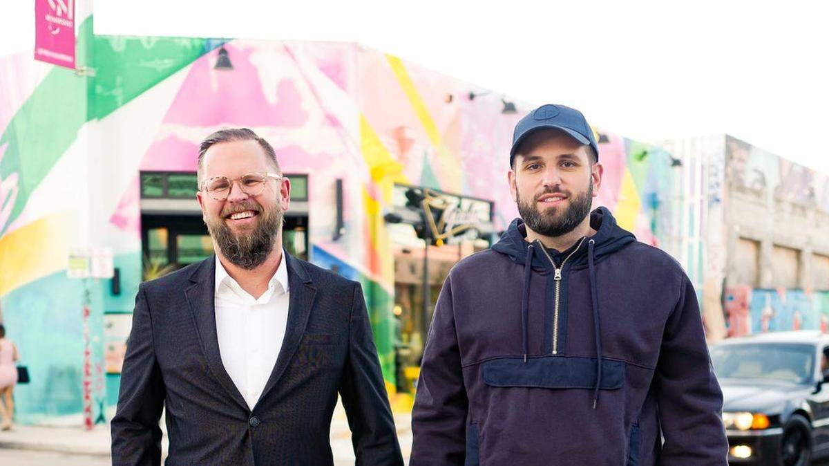 Harry Hurst, right, and his Pipe business partner Michal Cieplinski in Wynwood. Hurst is stranded in the U.K. because he can’t get an embassy appointment.