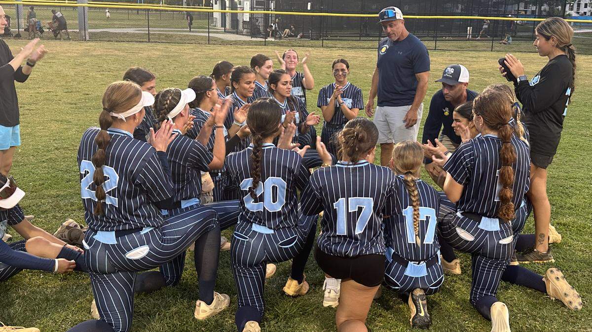 Coral Springs Charter’s softball team celebrates after beating Somerset Silver Palms on Tuesday in a Region 4-3A softball semifinal at Palmetto Bay Park.