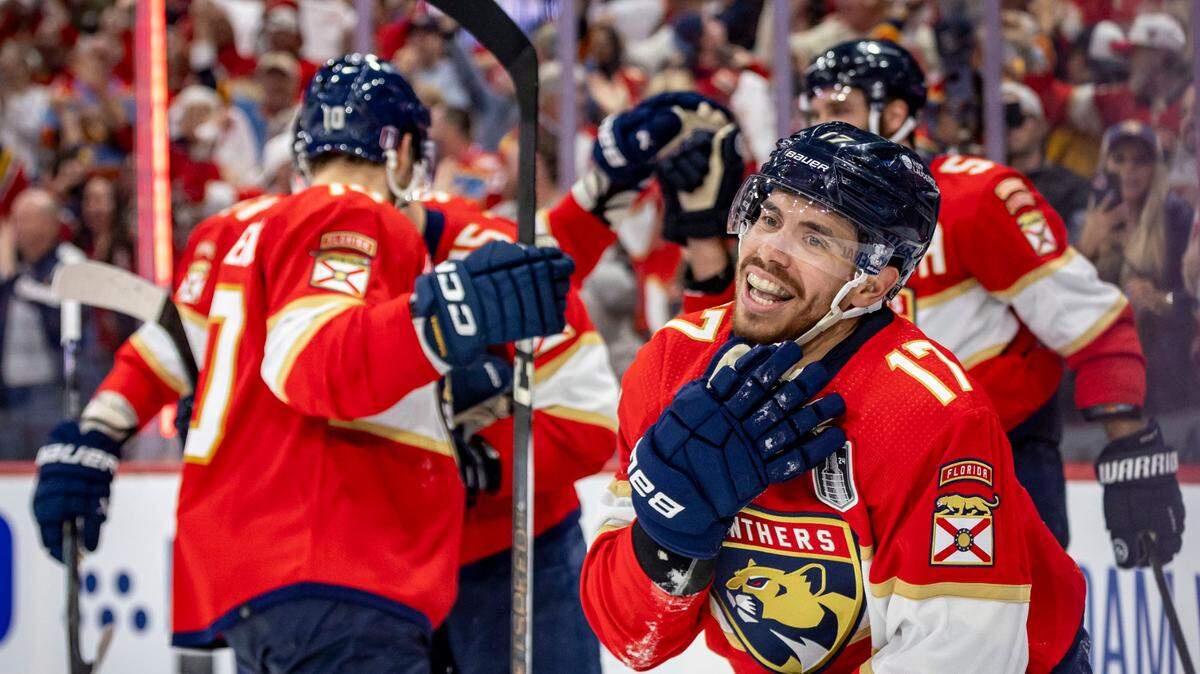 Sunrise, Florida, June 10, 2024 - Florida Panthers center Evan Rodrigues (17) skates away from teammates with a big smile on his face after scoring his second goal of the game in the third period to make the score 3-1 in favor of the Florida Panthers.