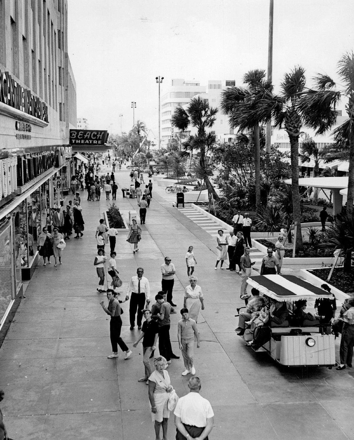 Shoppers and the tram on Lincoln Road in Miami Beach.