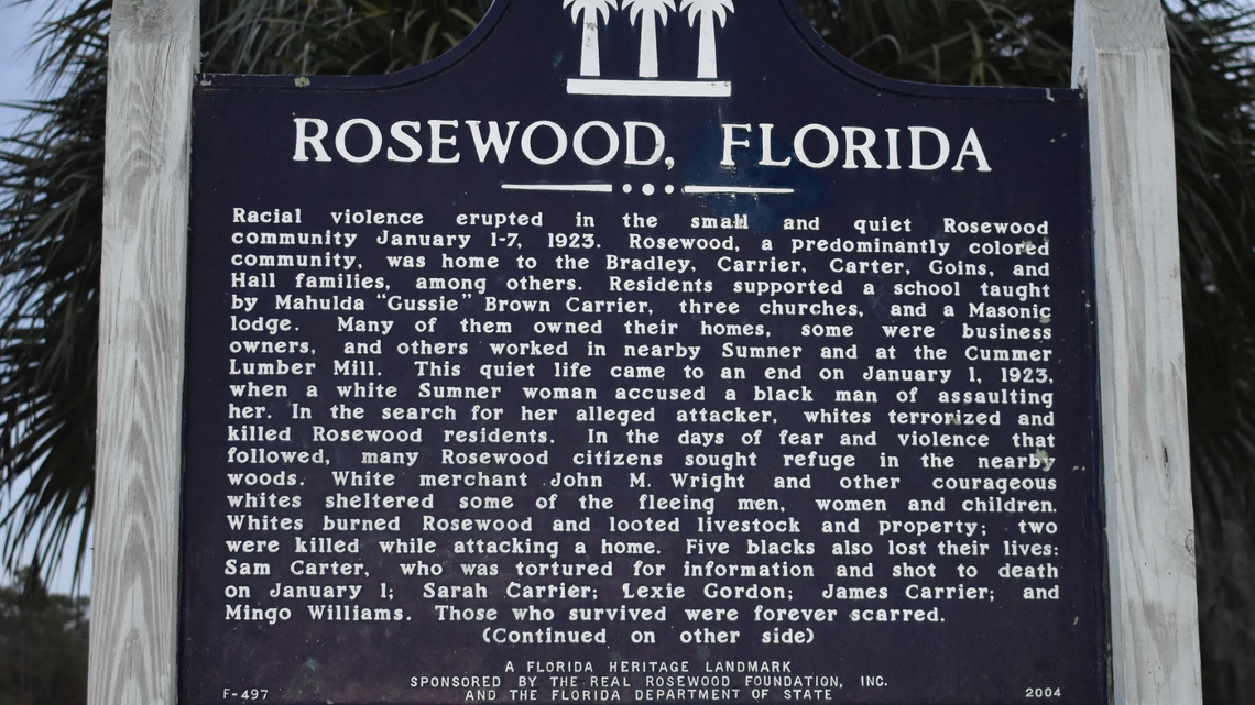 The Rosewood Historical Marker stands on the side of State Road 24 in Cedar Key, Florida on Thursday, Dec. 22, 2022. (Fresh Take Florida/Lauren Whiddon)