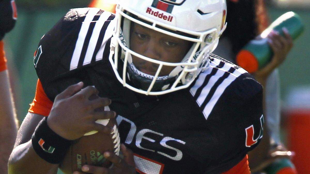 University of Miami Hurricanes quarterback N’Kosi Perry performs drills during football practice on Monday, August 6, 2018. Perry, along with the other quarterbacks, will get more opportunities during the first fall scrimmage of 2018 on Saturday, August 11, at Hard Rock Stadium.