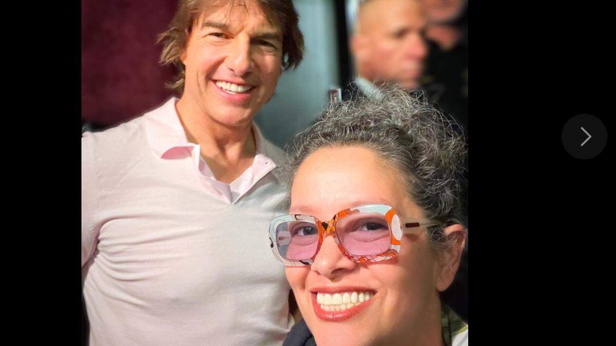 Moviegoers at Sunset Place’s AMC theater in South Miami were shocked to see Tom Cruise at the “Mission: Impossible” screening on Tuesday, July 11. 2023. Here, the actor poses with local entertainment reporter Monica Mendoza.