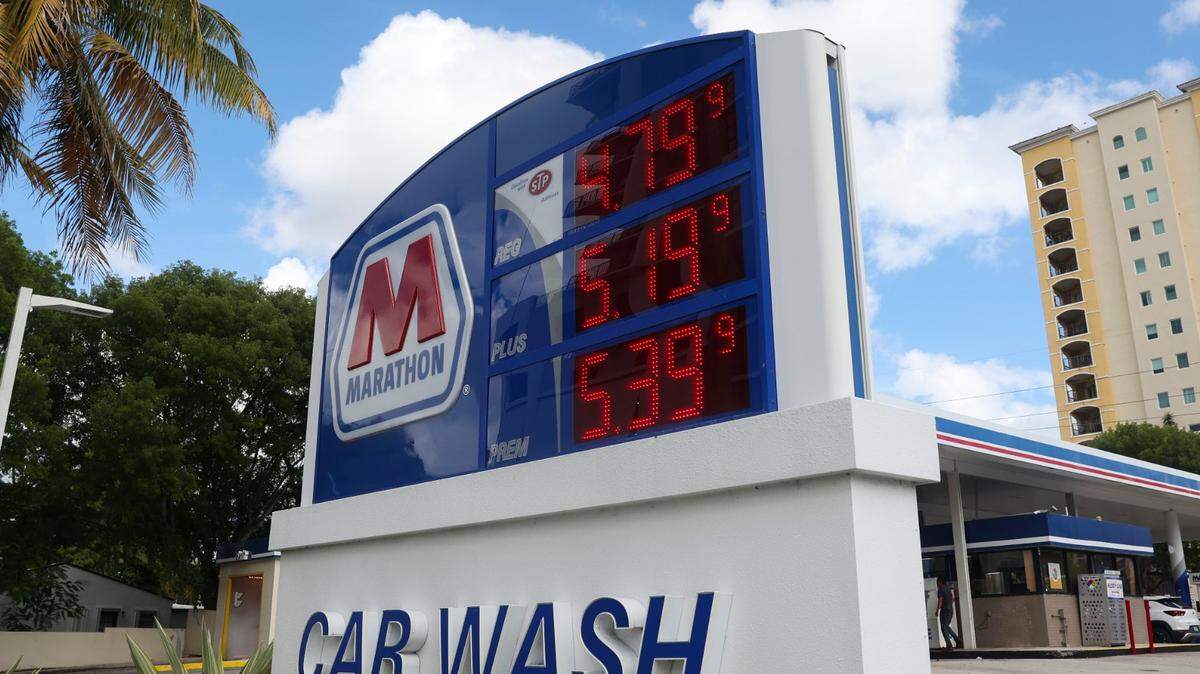 On Tuesday, Florida’s 25-cent-a-gallon gas tax returns, after a monthly holiday. That’ll boost prices at the pump. In this file photo, the sign of a Marathon gas station in Coral Gables shows gas prices when they dropped ahead of the Fourth of July weekend this summer.