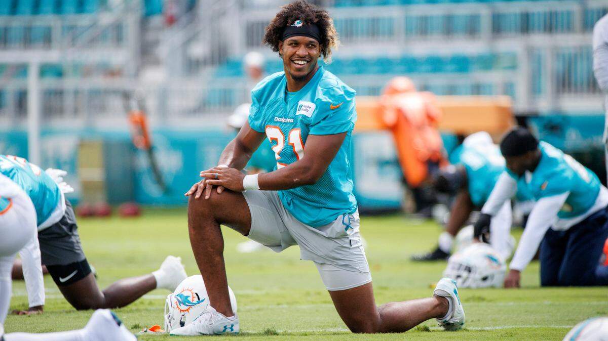 Miami Dolphins safety Eric Rowe (21) stretches on the field during practice at Baptist Health Training Complex in Hard Rock Stadium on Wednesday, October 5, 2022 in Miami Gardens, Florida.